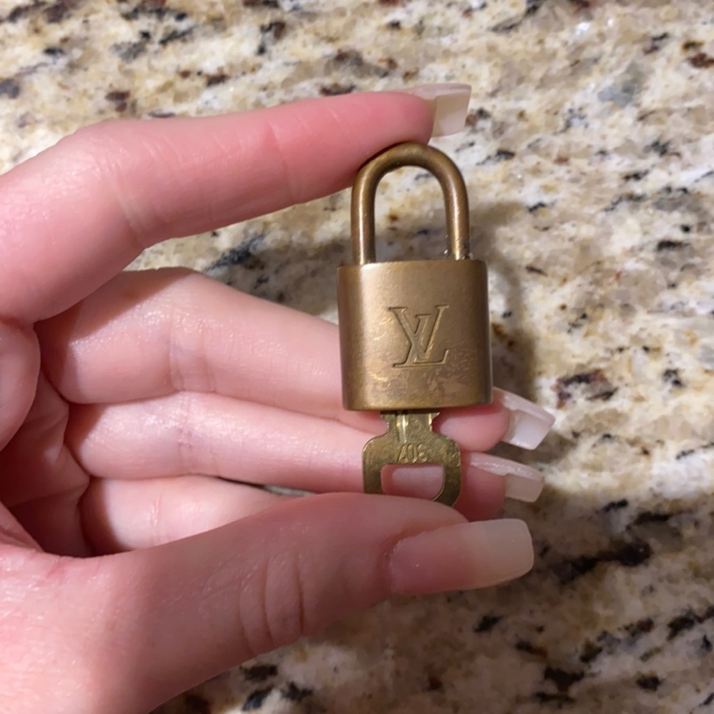 Louis Vuitton lock for purse